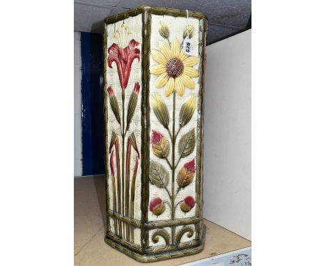 A HEXAGONAL WEDGWOOD UMBRELLA STAND with coloured glazed panels of sunflowers and lilies in relief against basketwork backgro