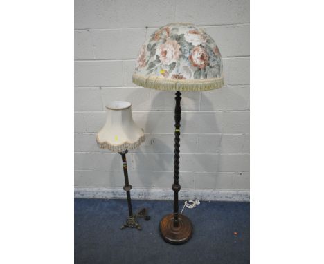 A SMALL BRASS LAMP, with spiral decorative design, raised on three dragon feet, height to fitting 109cm, along with an oak ba