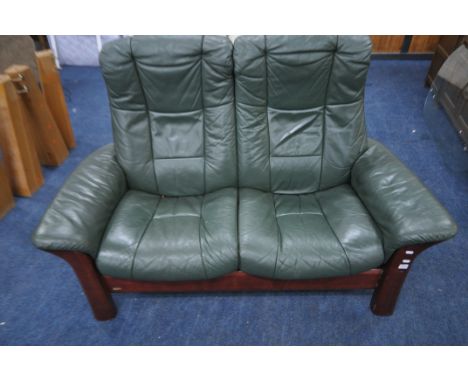 AN EKORNESS GREEN LEATHER TWO SEATER RECLINING SOFA, length 150cm x depth 73cm x height 103cm (condition report: frame with l