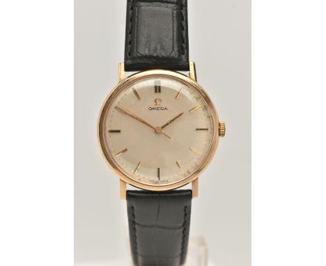 A GENTS 9CT GOLD 'OMEGA' WRISTWATCH, manual wind, round silvered dial signed 'Omega', baton markers, gold tone hands, in a po