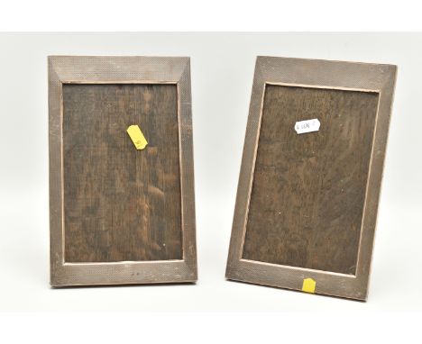 TWO EARLY 20TH CENTURY SILVER PHOTO FRAMES, two rectangular engine turned pattern photo frames, each hallmarked Birmingham 19