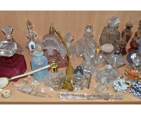 A LARGE GROUP OF MOSTLY GLASS PERFUME BOTTLES to include named manufacturers Britney Spears, a mid-century West German porcel