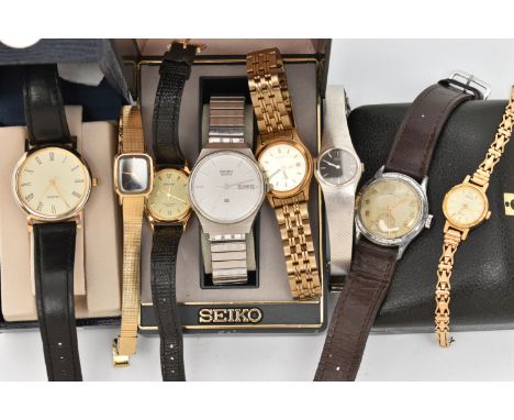 A SELECTION OF WATCHES, to include a boxed gents 'Seiko quartz', stainless steel wristwatch, round silver dial signed 'Seiko 