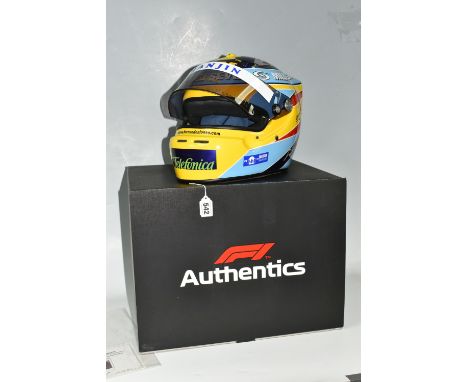 A BOXED 2006 RENAULT FERNANDO ALONSO FULL SIZE REPLICA HELMET, with dust bag and&nbsp; ' F1 Authentics' box, bears a signatur