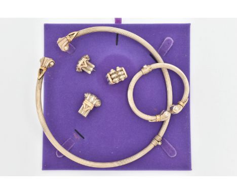 A FOUR PIECE WHITE METAL JEWELLERY SUITE, to include a hinged torque necklace, yellow metal detailing, stamped 0.46 14k 925, 
