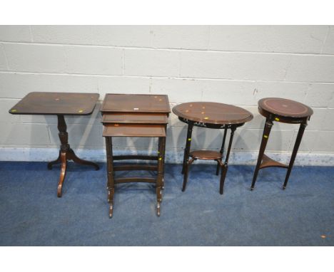 A 20TH CENTURY MAHOGANY NEST OF THREE TABLES, raised on turned legs and shaped feet, largest table width 51cm x depth 36cm x 