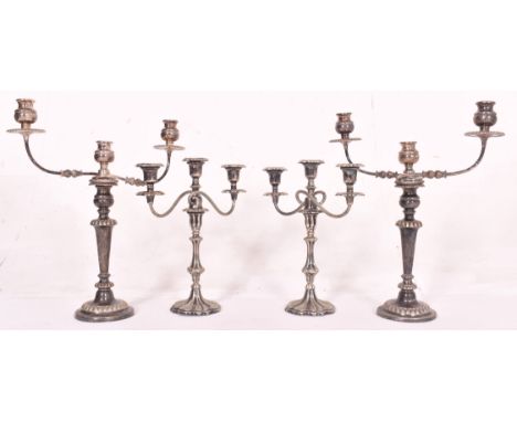 Two pairs of late 19th &amp; early 20th century High Victorian silver plated candelabras. The smaller pair with three candles