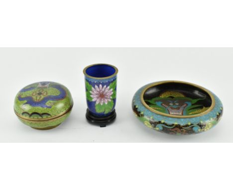 A collection of three 20th century cloisonne pieces. The lot comprising a cloisonne black ground Dragon bowl, an olive green 