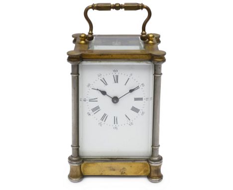 A late 19th century French cased gilt brass carriage timepiecewhite enamel dial with black Roman numerals, minute markers and