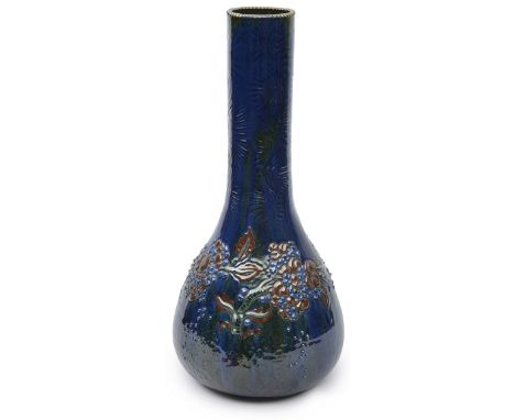 An Elton ware bottle vase, c.1900, by Sir Edmund Elton (1846-1920), heavily glazed, foliate relief detail, signed to base 'El