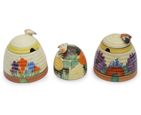 Clarice Cliff for Newport Pottery: A Bizarre Jelecia pattern beehive honey potof ribbed form, bee finial to domed cover, mark
