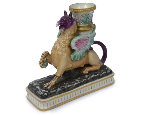 A Royal Worcester Griffin form candlestick, circa 1880, handpainted in enamels and gilt embellished, modelled with relief mou