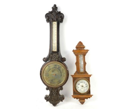 Oak banjo form barometer and two others .    