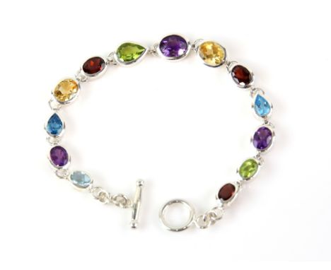 Multi gem set bracelet, oval cut and pear cut  amethyst, garnets, peridot, and blue topaz, 'T' bar clasp, total length 19cm, 