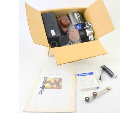 Collection of vintage cameras and lenses including Practika.    