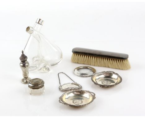 Selection of silver items to include a pair of Persian silver dishes, a decanter label, photo frame, large oil pourer and oth