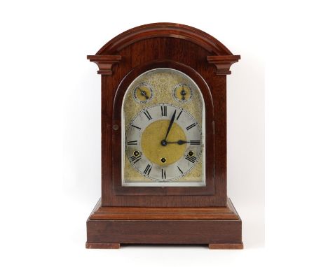 Mahogany cased three train mantel clock 43cm high.    