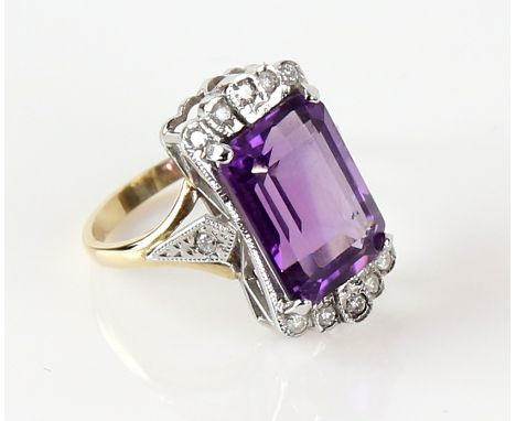 Art Deco style ring set with large step cut  amethyst and diamonds, in gold mount, 9 ct, ring size M 1/2  .    CONDITION9 ct 