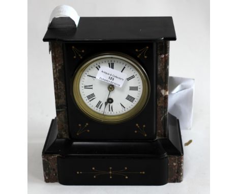 Polished slate single train mantel clock .    