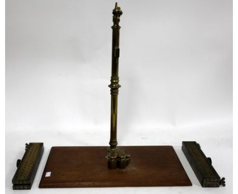 Collection of brass pill presses medical scales and other relate items (2 shelves)..    