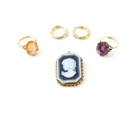 A group of jewellery, including a oval cut amethyst cocktail ring, size M, shell cameo ring, size N, cameo pendant and a pair