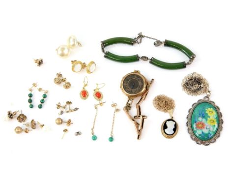 A mixed group of jewellery including, stud earrings, some in gold, a gold watch case on bracelet strap, enamelled silver pend