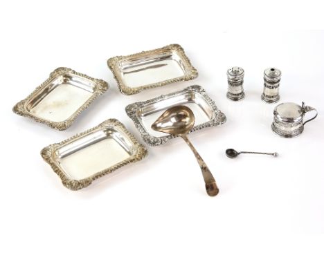 Cased piece silver cruet set with pierced decoration, a box silver ladle and a cased set of four plated dishes .    