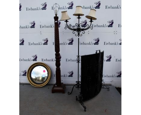 Gilt framed mirror, mahogany standard lamp cast iron standard lamp and  fire gaurd.    