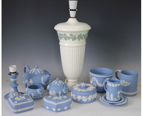 A collection of twelve pieces of Wedgwood Jasperware, including a three piece tea set, with a tall Wedgwood fluted Etruria la