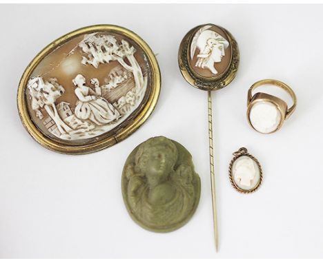 A selection of cameo jewellery, to include; a cameo brooch, a cameo set ring, a pendant and a stick pin along with a lava cam