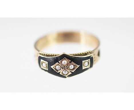 A 9ct gold mourning ring, Chester 1897, the black enamel ring set with split seed pearls, weight 2gms