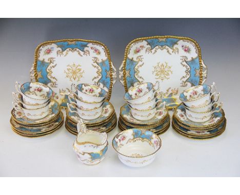 A Coalport turquoise batwing pattern tea service, early 20th century, pattern Y2665, comprising; twelve cups, twelve saucers,