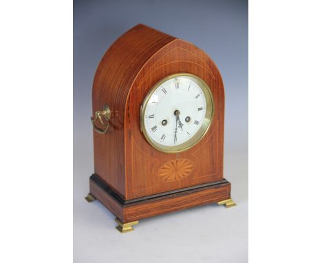 An Edwardian inlaid mahogany lancet shaped mantel clock, with Roman numeral dial and movement striking on a gong, 30cm, with 