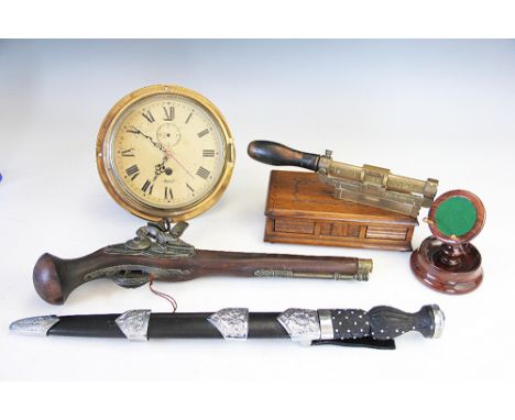 An E. R. Watts and Son brass range finder, model 1344, a brass bulk head time piece with replaced modern movement, a Scottish