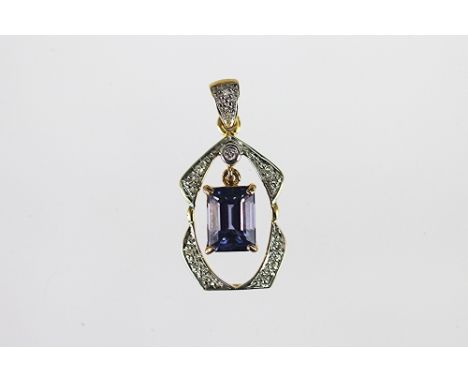 A tanzanite and diamond pendant set in 18k yellow gold, the step cut within a four claw setting and an outer diamond set surr