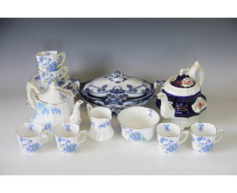 A Royal Stafford bone china twenty piece part tea set, along with a wisteria pattern teapot and cover with flower moulded han