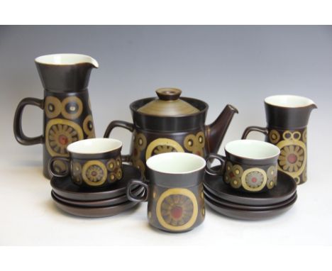 A Denby Arabesque pattern tea and coffee service, to include; teapot and cover, three jugs in varying sizes, sugar bowl, nine