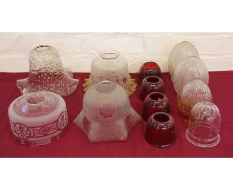 A set of four Victorian ruby glass light shades, 7cm with two frosted and cut glass pointed shades, a similar smaller amber g