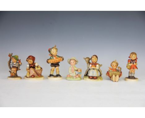 Six Hummel for Goebel figures of children, to include; The School Girl, Accordian Boy, Good Friend, Apple Tree Boy, Let's Sin