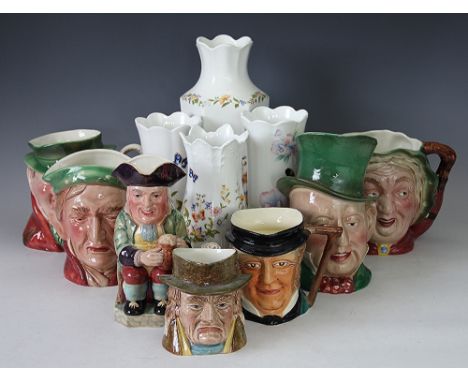 A collection of Beswick Character jugs, including 310 Micawber, Tony Weller, Sairley Gamp, with a collection of Aynsley Bone 