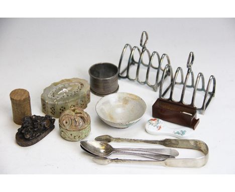 A pair of George III silver sugar nips and two Old English teaspoons, a pair of silver plated four division toast racks, 8.5c
