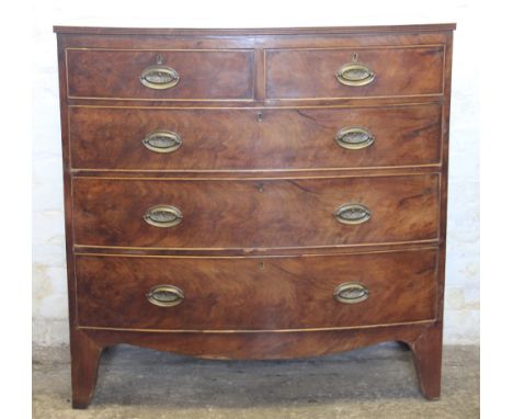 A George III mahogany bow front chest, of two short and three graduated long drawers, on bracket feet, 105.5cm H x 103cm W x 