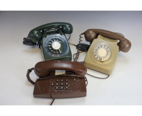 Three vintage telephones, to include; a bottle green example 706L GNA 66/1, another similar green example and a later brown t