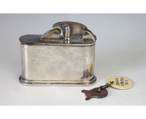 An Art Deco silver plated cigarette lighter and key, possibly a club lighter, un-named, 10cm long (2)