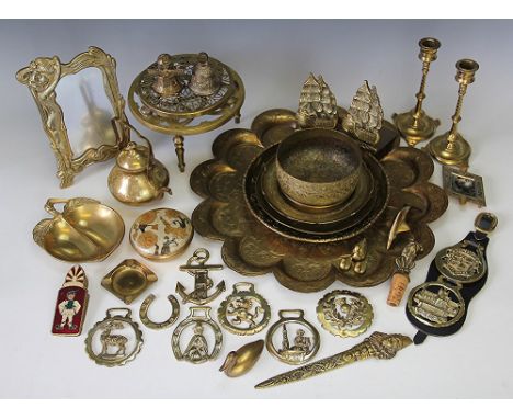 A miscellaneous collection of brass wares, to include an Art Nouveau style frame, cork with novelty dog stopper, candle snuff
