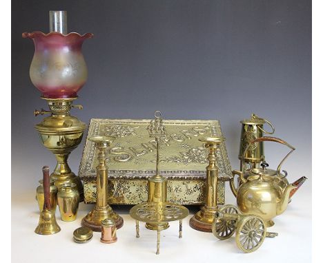 A collection of brass wares and silver plate, to include; an oil lamp with glass shade, a brass 'slipper' box, a silver plate