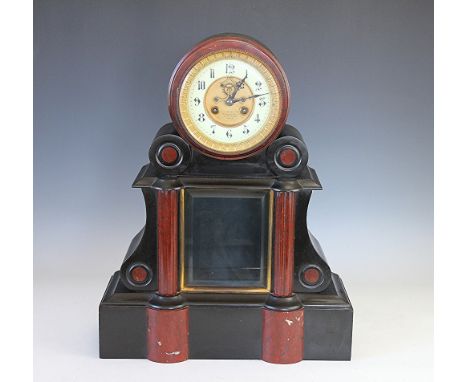 A Victorian marble mantle clock, the dial with Arabic chapter ring and visible escapement, the centre signed A La Gerbe d'or 