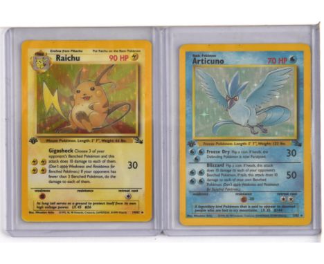 Pokemon TCG. Lot of 2x 1st edition fossil holos including Raichu 14/62 and Articuno 2/62. Condition Report:  Light Play condi