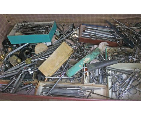 A suitcase containing vintage dental tools etc  