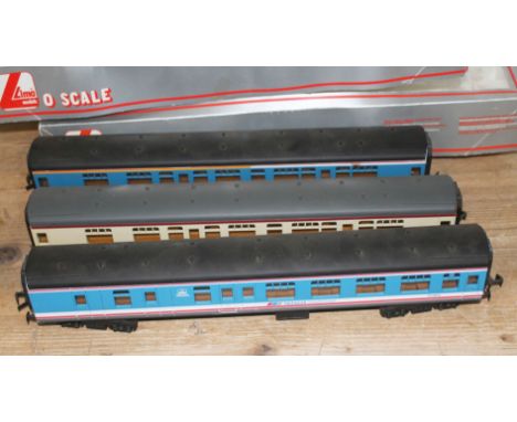 A group of three Lima 0 gauge carriages, with two boxes.  